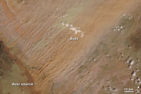 Dust sweeps northeast from distinct sources in central Arizona in this image from April 3 ,2009 . The dust plumes are tan and orange , depending on the type of soil that is being pulled into the air.